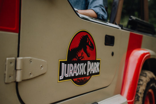 jurassic park logo on side of vehicle